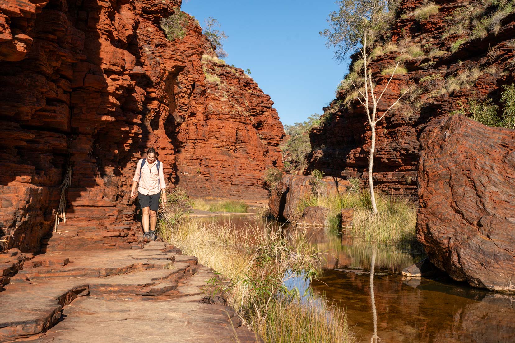 Shelley walking along the edge of Kalamina Gorge