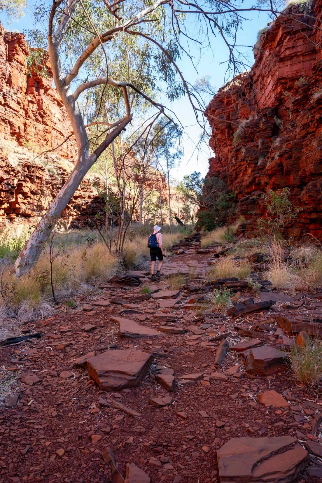 Shelley walking over rocks in Weano Gorge