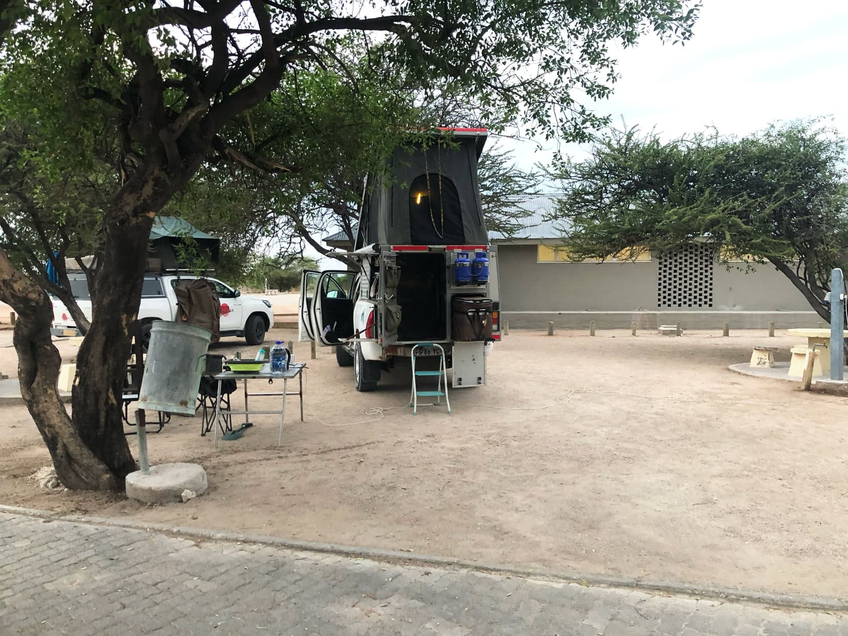 Etosha-Okaukuejo-Camp our car with roof top tent set up 